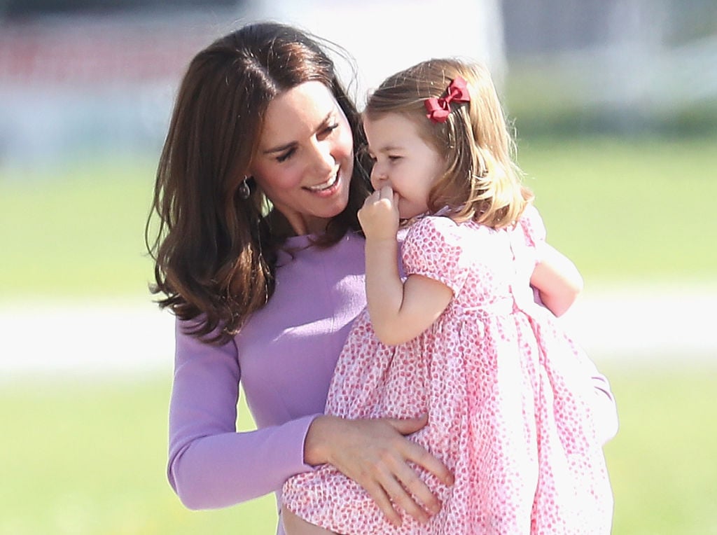 Kate Middleton holding her daughter, Princess Charlotte