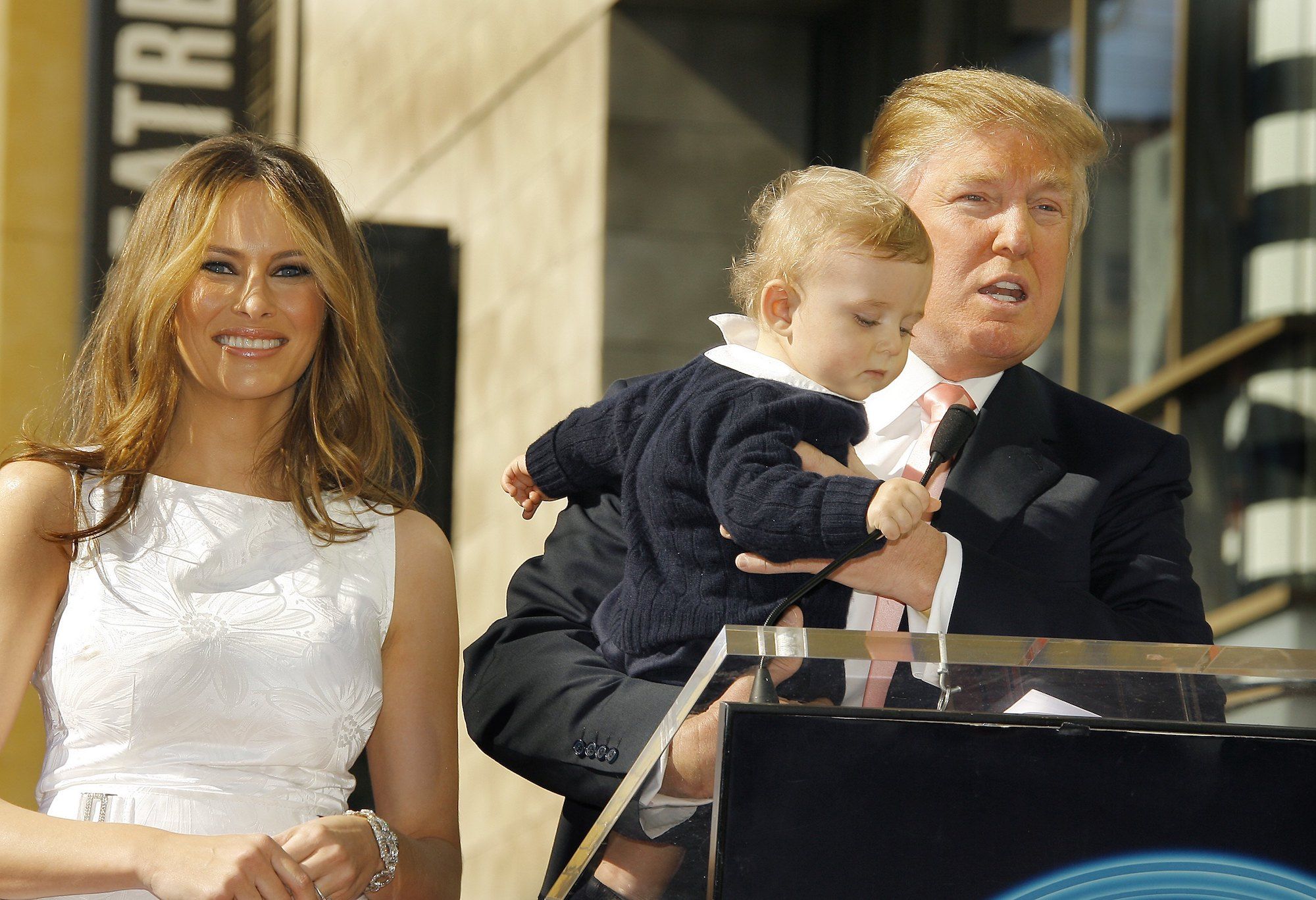 Donald Trump, wife Melania, and son Baron. Donald Trump, wife Melania. and son Baron attend the ceremony honoring him with a star on the Hollywood Walk of Fame