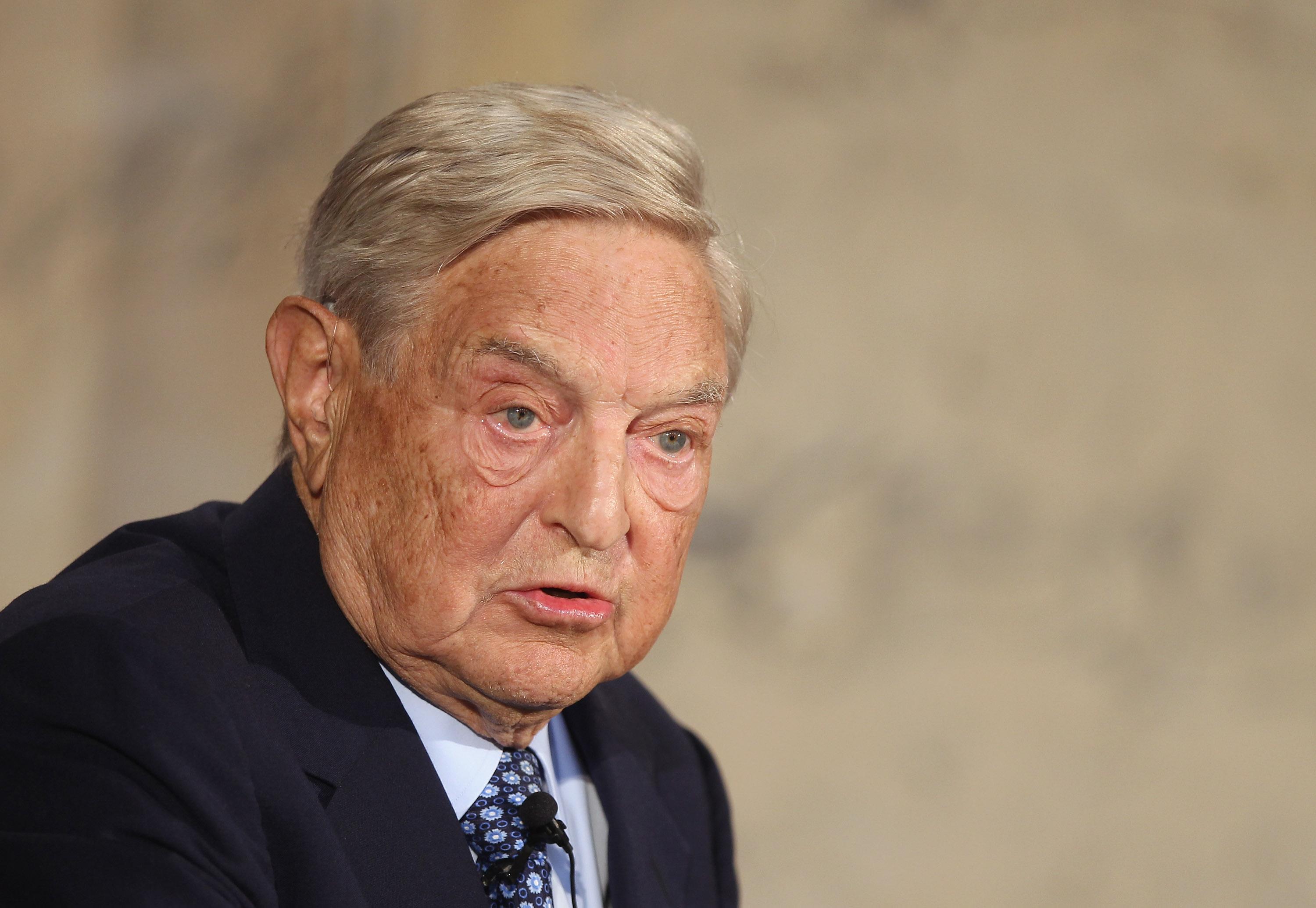 how does soros make his money