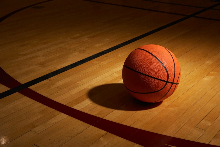 Basketball on a basketball court