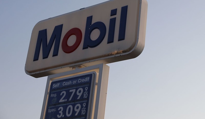 MIAMI, FL - APRIL 09: A sign displaying the price of gasoline per gallon is seen at a Mobil gas station as reports indicate that the price of gas continues to rise on April 9, 2018 in Miami, Florida. AAA forecasts the national gas price average will be as much as $2.70/gallon this spring and summer.