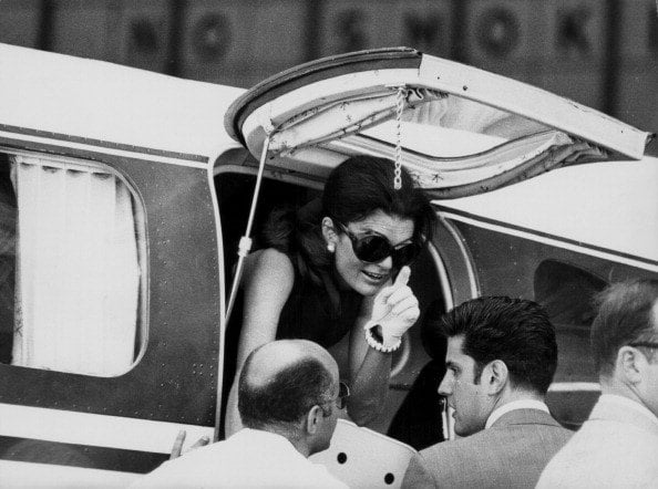 Jacqueline Onassis, formerly Kennedy, leaving an airplane to greet her children in Athens, July 3rd 1969