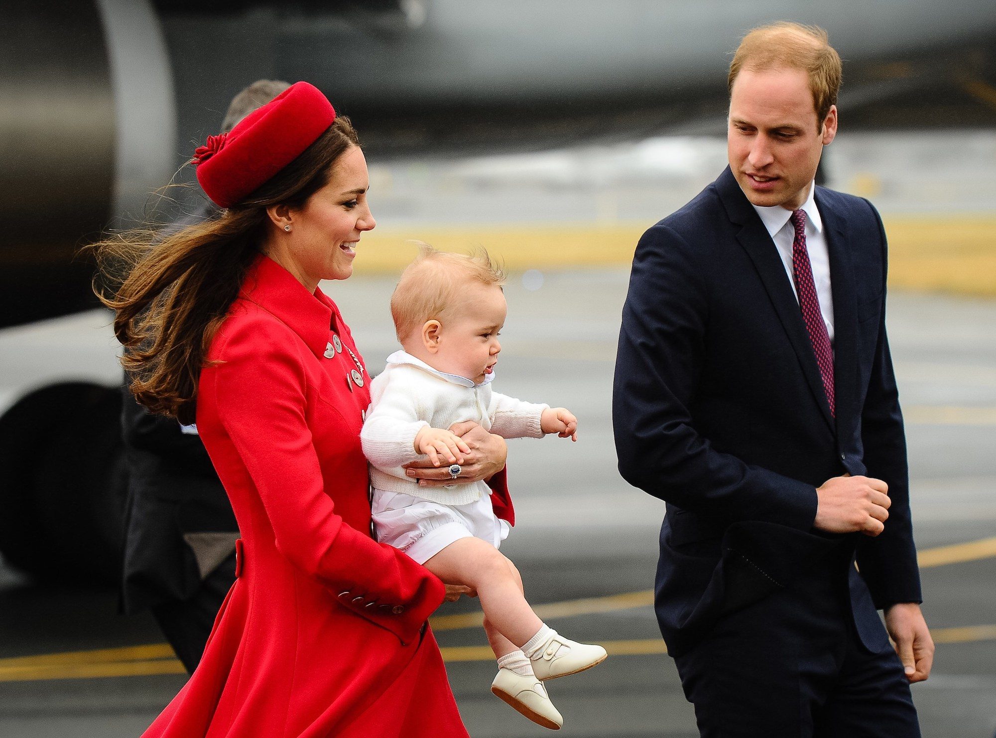 Kate Middleton, Prince William, and Prince George arrive for a three-week tour of New Zealand and Australia