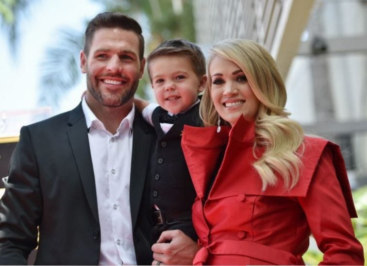Carrie Underwood, Mike Fisher, and their son, Isaiah Carrie Underwood, Mike Fisher, and their son, Isaiah