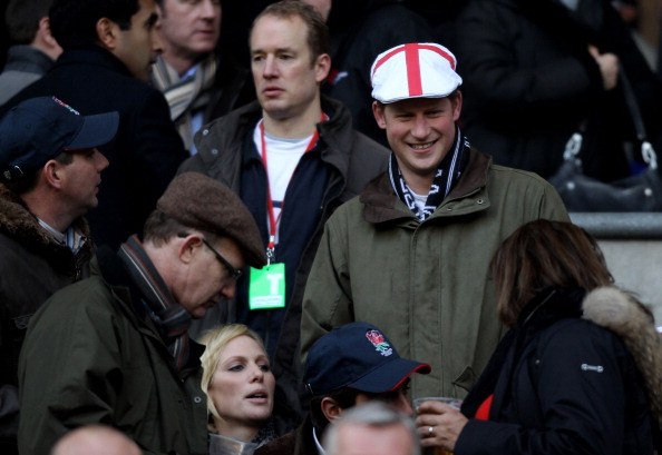 Zara Phillips and Prince Harry look on prior to the RBS 6 Nations Championship match between England and France at Twickenham Stadium on February 26, 2011