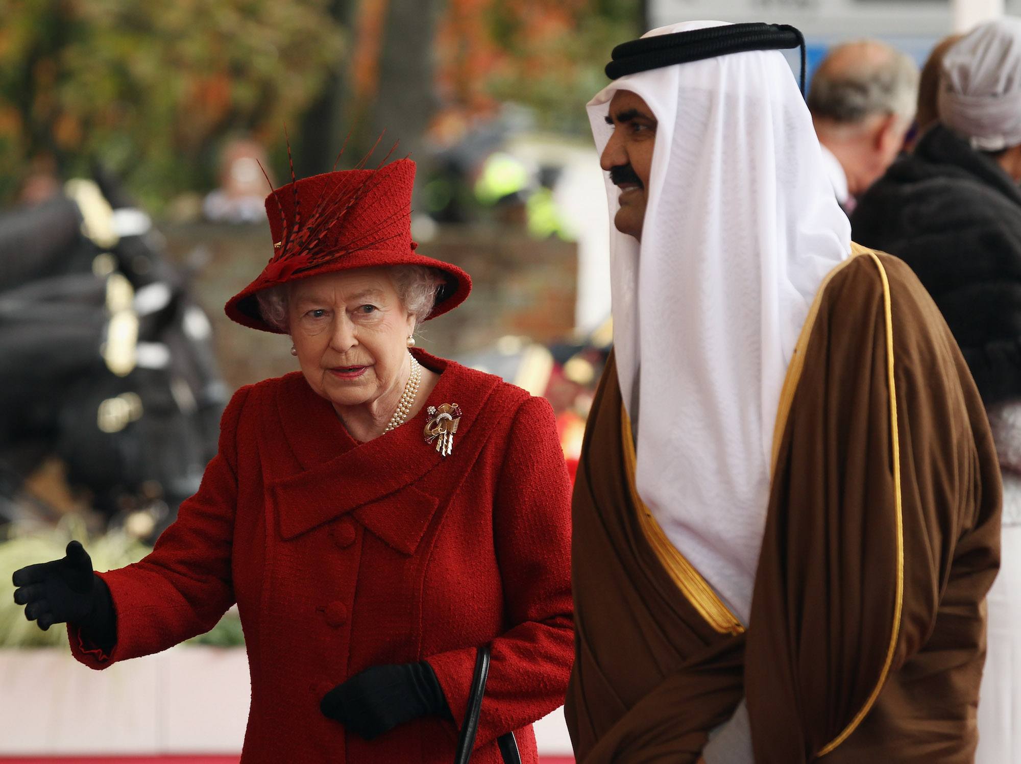 The Emir of Qatar, Sheikh Hamad bin Khalifa al Thani is greeted by Queen Elizabeth II