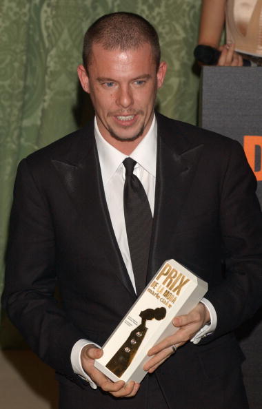 British designer Alexander McQueen receives a Marie Claire Fashion award at the 1st Edition of the Marie Claire Magazine Fashion Awards at French Embassy November 18, 2003 in Madrid, Spain