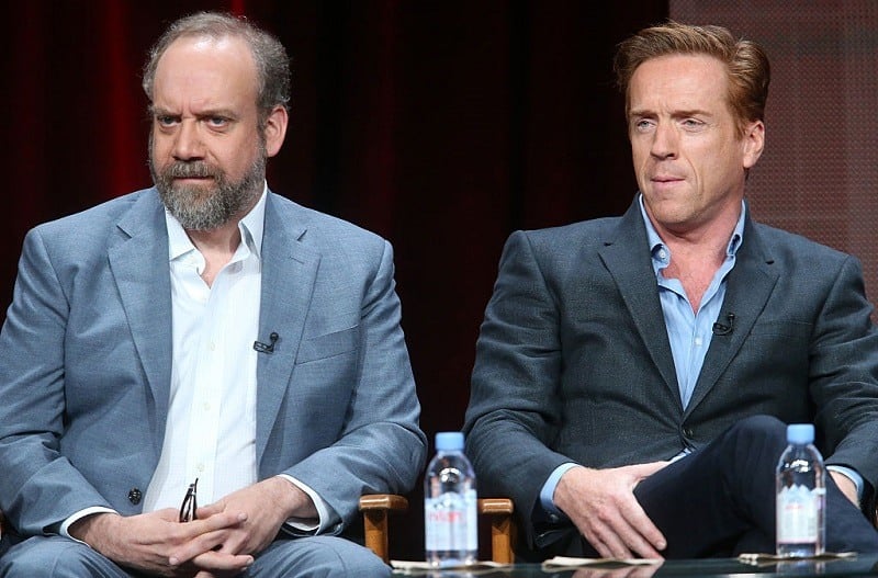 BEVERLY HILLS, CA - AUGUST 11: Actors Paul Giamatti (L) and Damian Lewis speak onstage during the 'Billions' panel discussion at the Showtime portion of the 2015 Summer TCA Tour at The Beverly Hilton Hotel on August 11, 2015 in Beverly Hills, California.