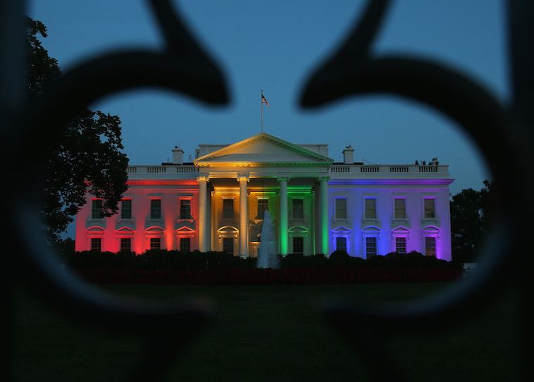 Rainbow-colored lights shine on the White House Rainbow-colored lights shine on the White House