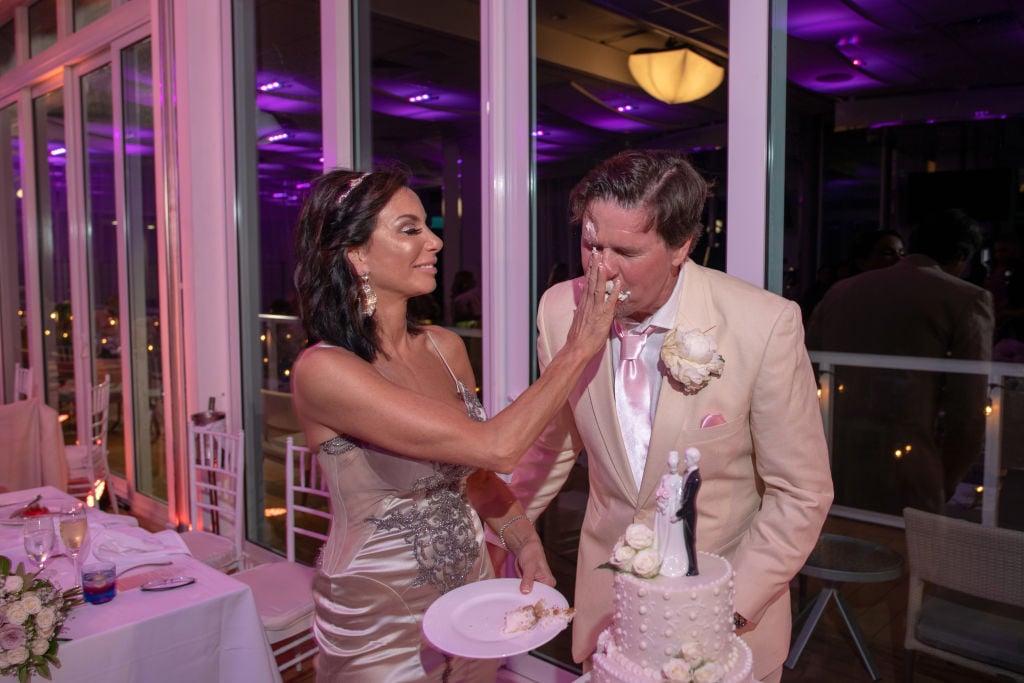 Danielle Staub and Martin Caffrey cut their wedding cake in Bimini on May 5, 2018 in Bimini, Bahamas.