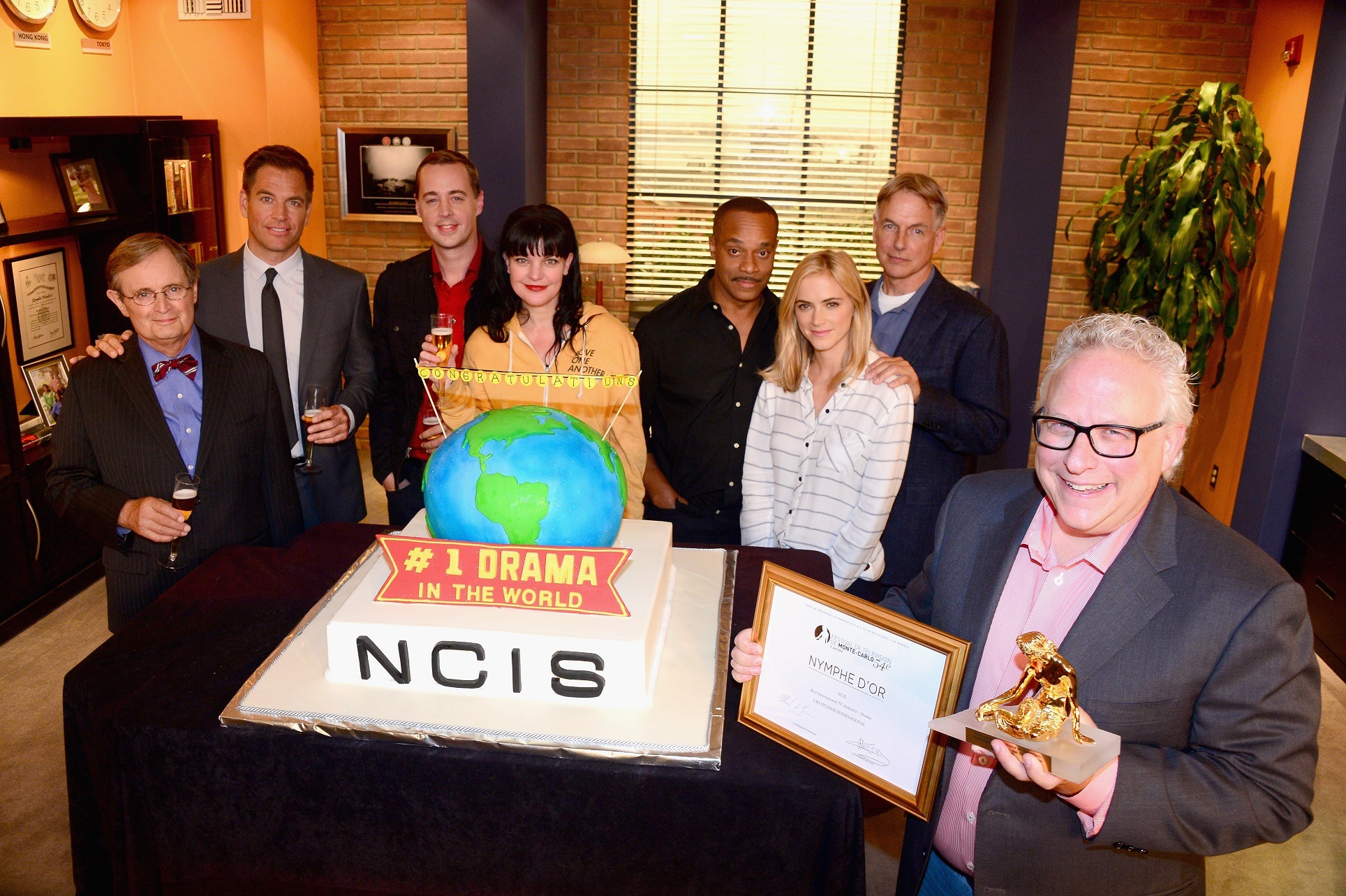 Emily Wickersham (third from right) and the cast of NCIS.