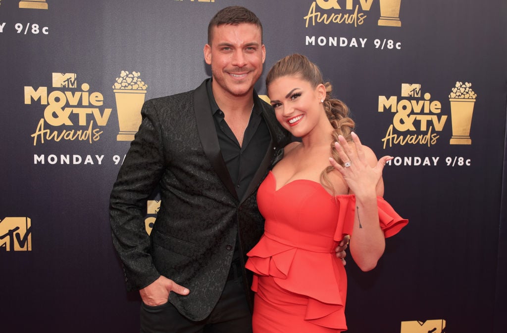 Jax Taylor (L) and Brittany Cartwright attend the 2018 MTV Movie And TV Awards at Barker Hangar on June 16, 2018 in Santa Monica, California. 