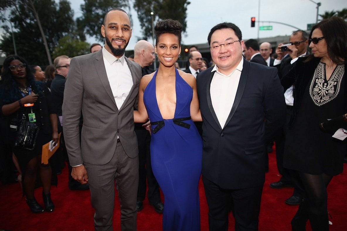 Jho Low (right) with Swizz Beats and Alicia Keys at the 2014 Grammy Awards.