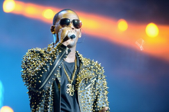 R. Kelly performs onstage during R. Kelly, New Edition and The Jacksons at the 2013 BET Experience