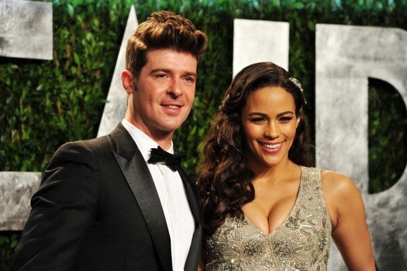 Robin Thicke and actress Paula Patton arrive at the 2012 Vanity Fair Oscar Party hosted by Graydon Carter at Sunset Tower on February 26, 2012 in West Hollywood, California.
