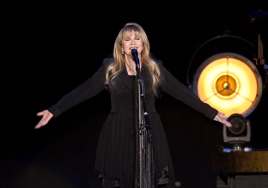 Stevie Nicks sings during a solo tour performance in 2016.