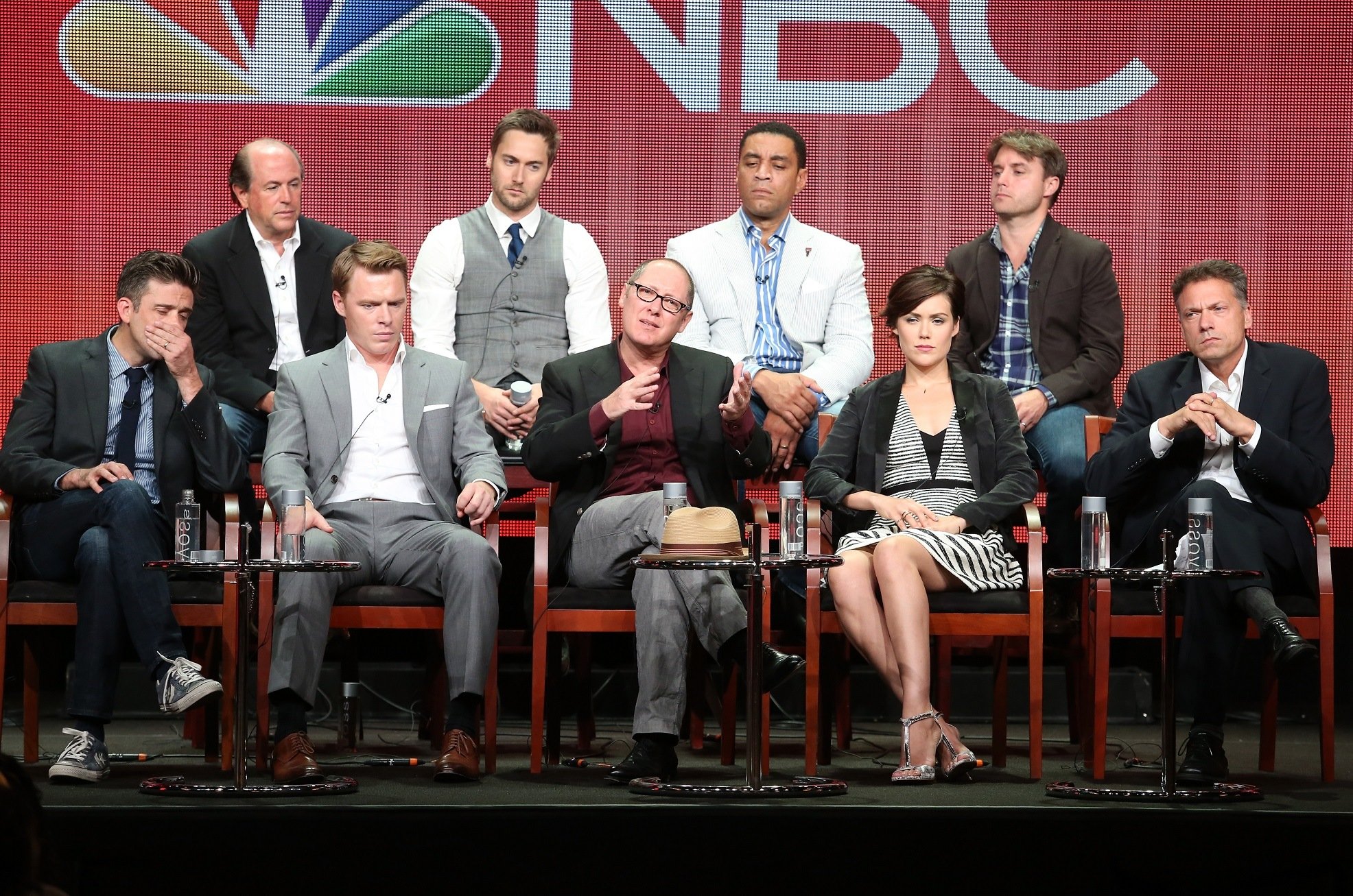 Megan Boone (front row, second from right) and the cast of NBC drama The Blacklist.