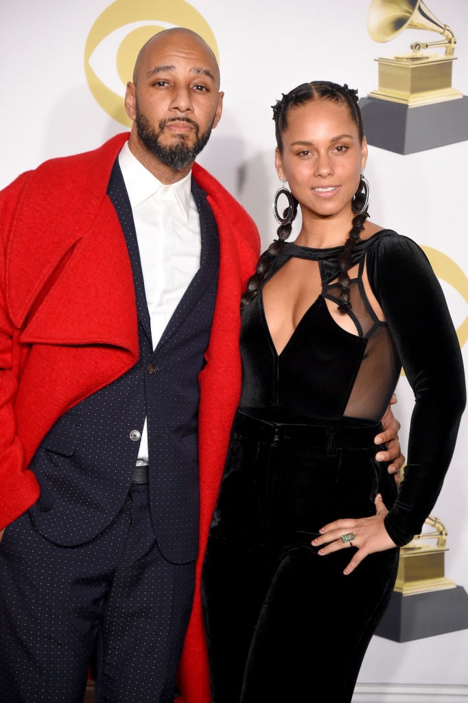 Swizz Beatz (L) and Alicia Keys pose in the press room during the 60th Annual GRAMMY Awards at Madison Square Garden on January 28, 2018 in New York City. 