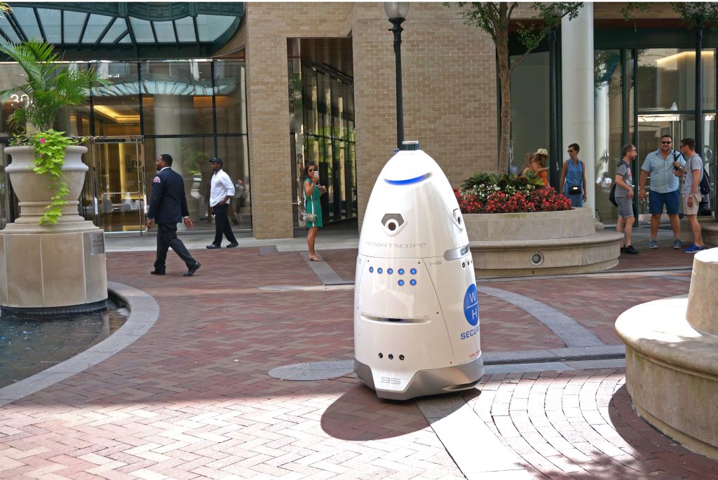 A robot patrols a community
