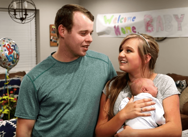 Joseph Duggar and Kendra Caldwell with their son Garrett.