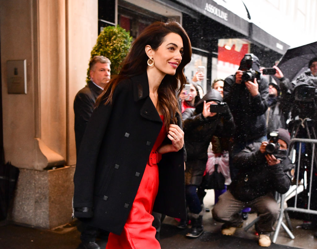 Amal Clooney walks into The Mark Hotel ahead of Meghan Markle's baby shower.