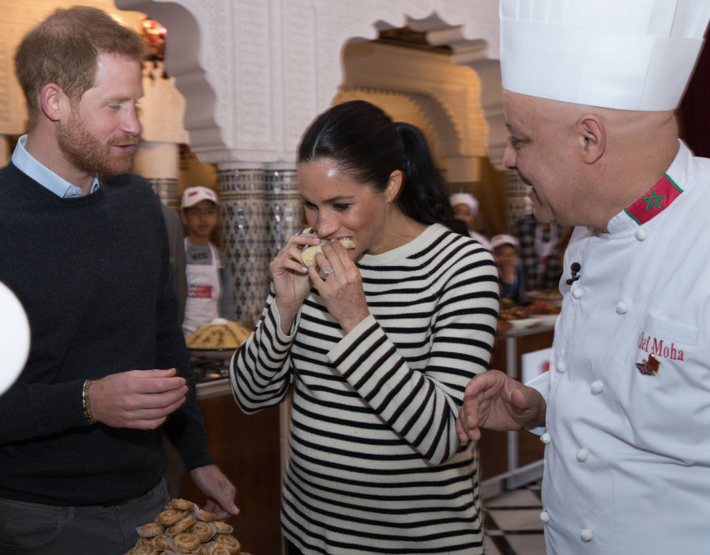 Prince Harry, Duke of Sussex and Meghan, Duchess of Sussex attend a cooking demonstration