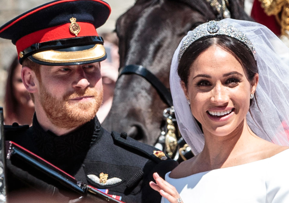Meghan and Harry together smiling