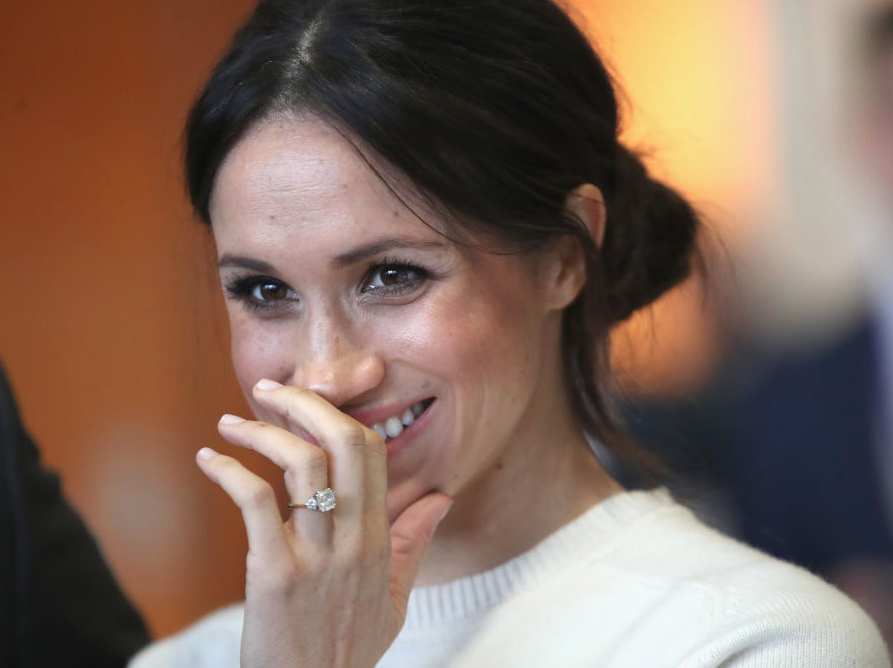 Meghan Markle hiding her mouth