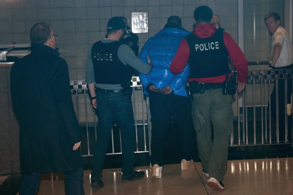 R. Kelly is taken into custody| Scott Olson/Getty Images