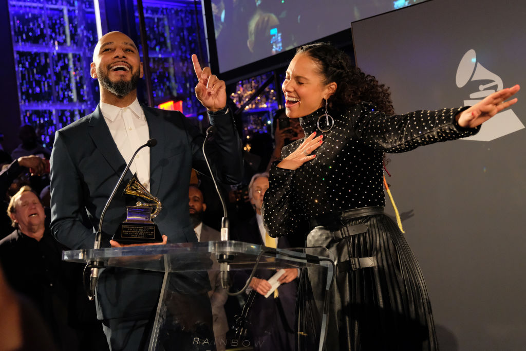 Swizz Beatz and Alicia Keys accept award at the Producers and Engineers Wing 11th Annual GRAMMY Week Event Honoring Swizz Beatz And Alicia Keys at The Rainbow Room on January 25, 2018 in New York City. | Matthew Eisman/Getty Images for NARAS