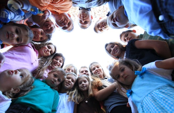 The Bates family from "Bringing Up Bates" stare into the camera during a promotional photo shoot 