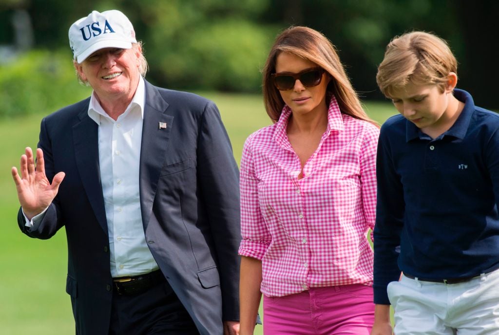 Donald Trump with Melania and Barron Trump | Saul Loeb/AFP/Getty Images