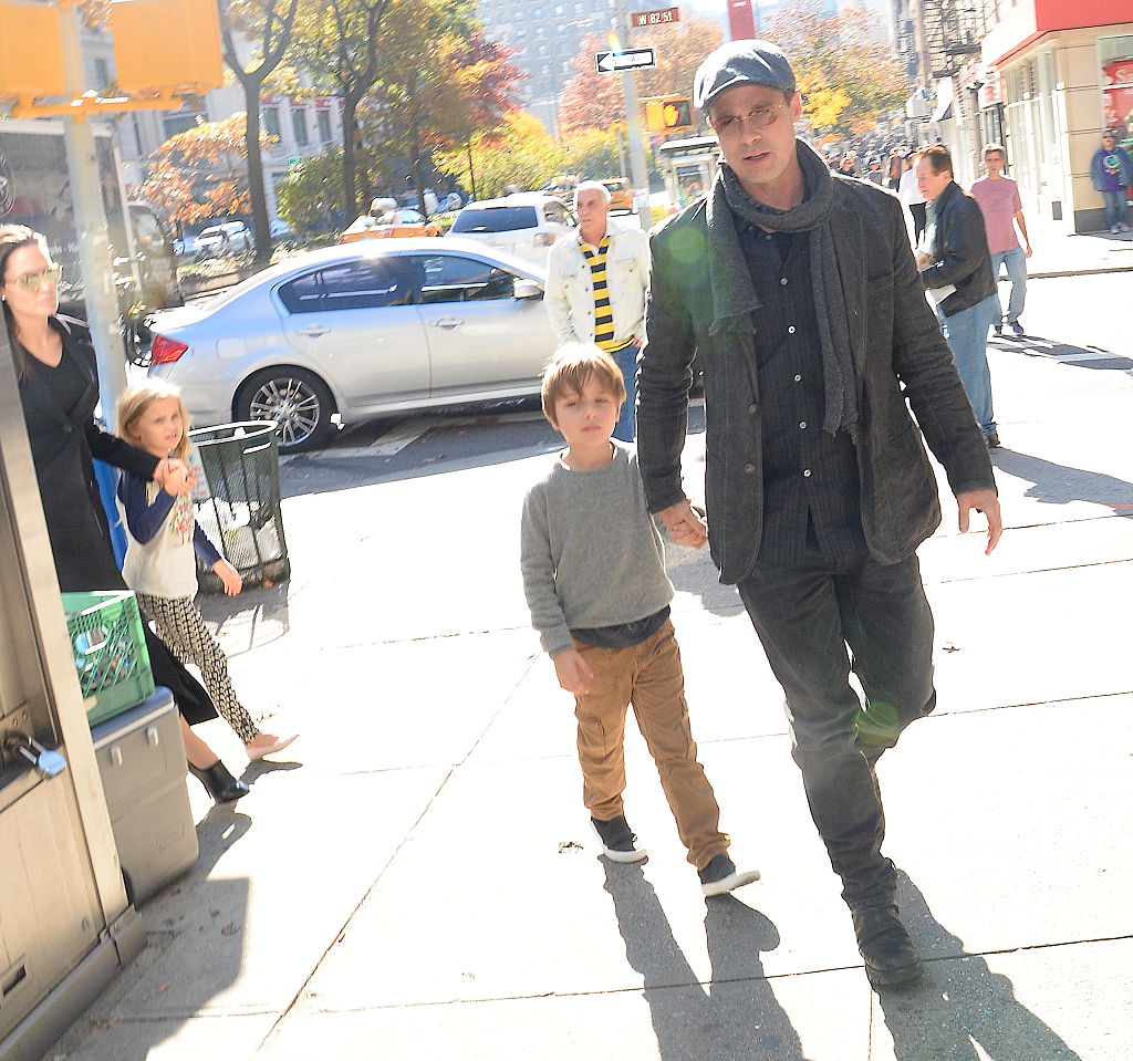 Brad Pitt and Angelina Jolie with their children. | Raymond Hall/GC Images