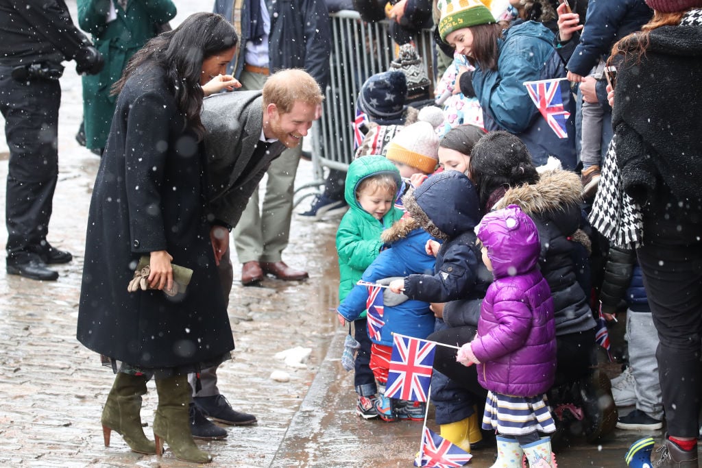 Prince Harry and Meghan Markle with kids