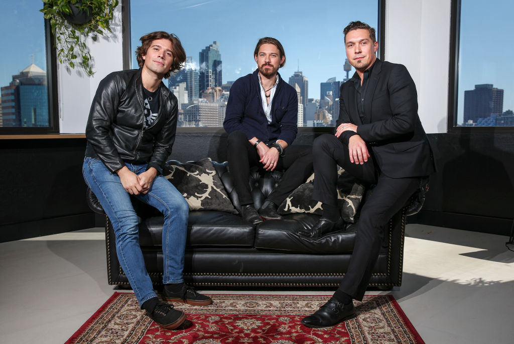 Zac Hanson, Taylor, Hanson, and Isaac Hanson.