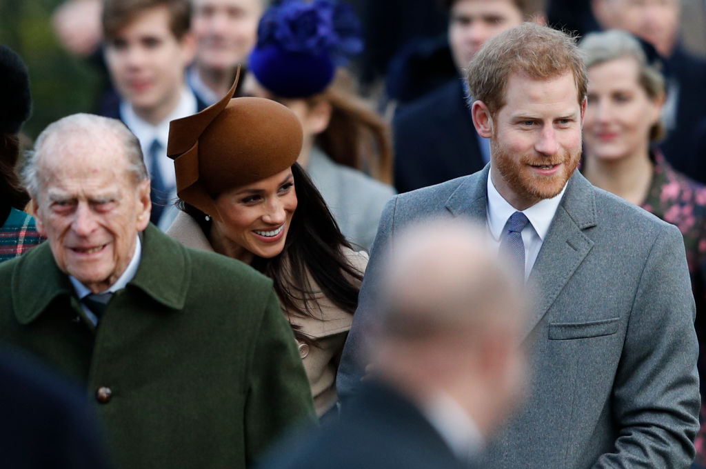 Prince Philip walks with Meghan Markle and Prince Harry