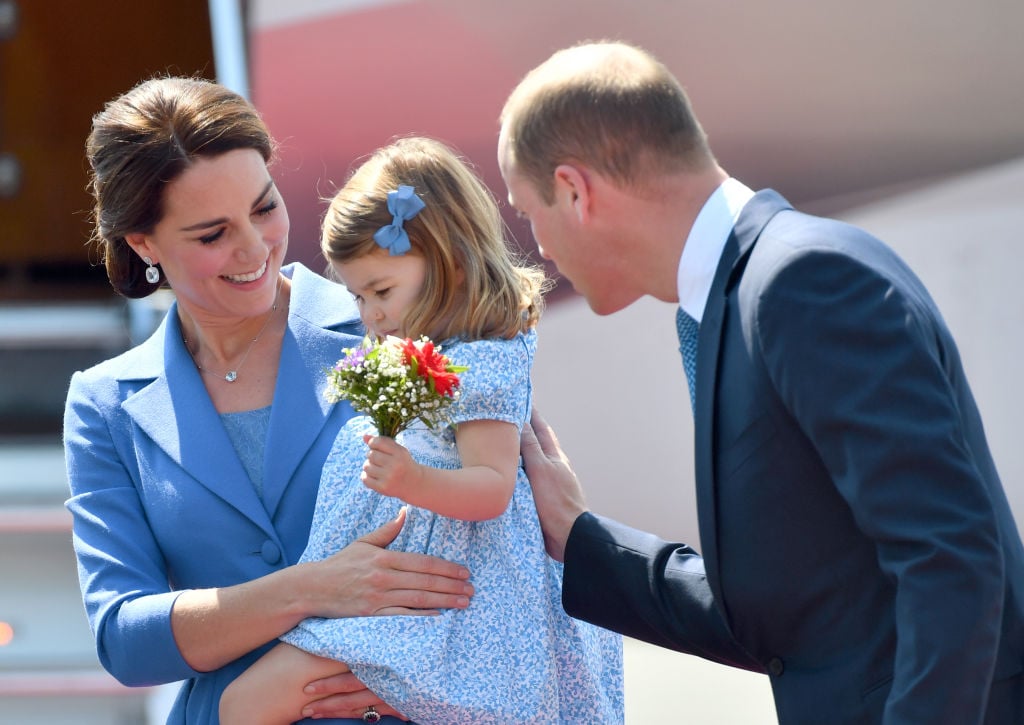 Princess Charlotte with Kate Middleton and Prince William