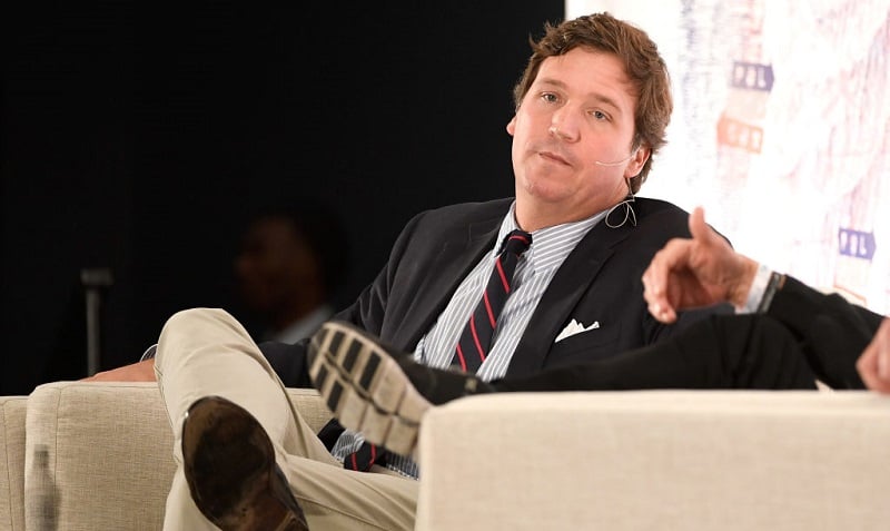 LOS ANGELES, CA - OCTOBER 21:  Tucker Carlson speaks onstage at Politicon 2018 at Los Angeles Convention Center on October 21, 2018 in Los Angeles, California.