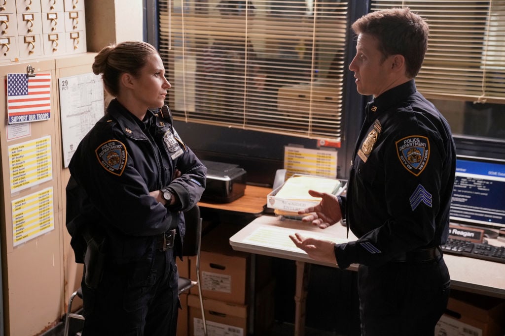 Vanessa Ray as Eddie Janko and Will Estes as Jamie Reagan