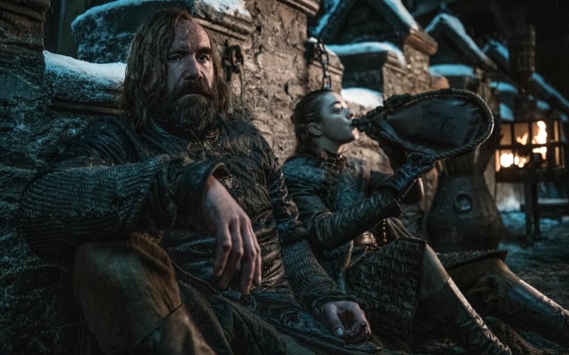 Rory McCann as The Hound and Maisie Williams as Arya Stark on Game of Thrones