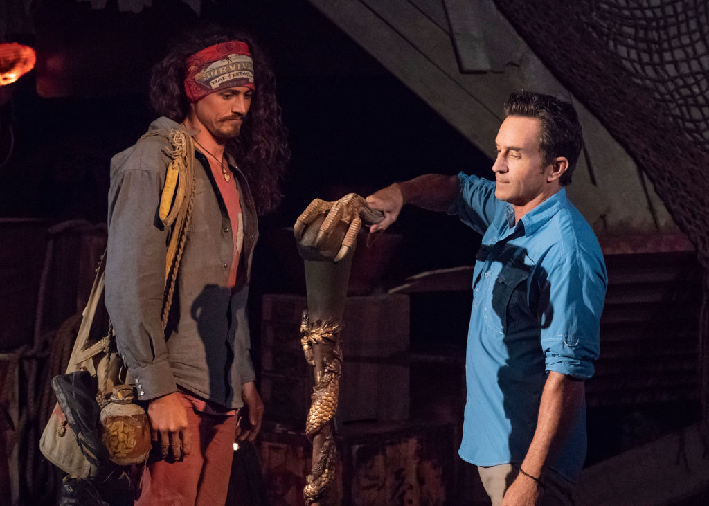 Jeff Probst extinguishes Joe Anglim's torch at Tribal Council