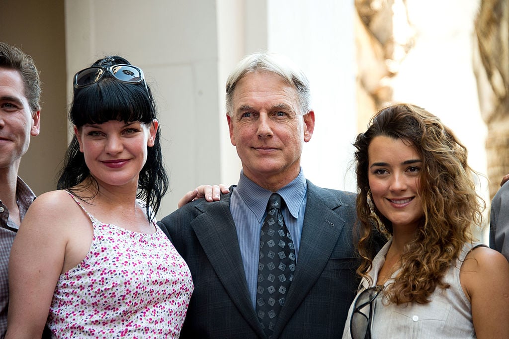 Pauley Perrette, Mark Harmon, and Cote de Pablo from 'NCIS.'