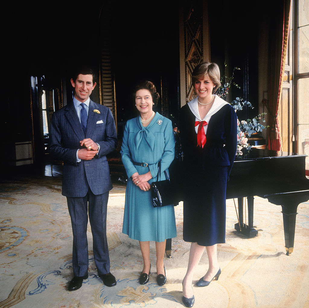 Prince Charles, Queen Elizabeth II, and Princess Diana.