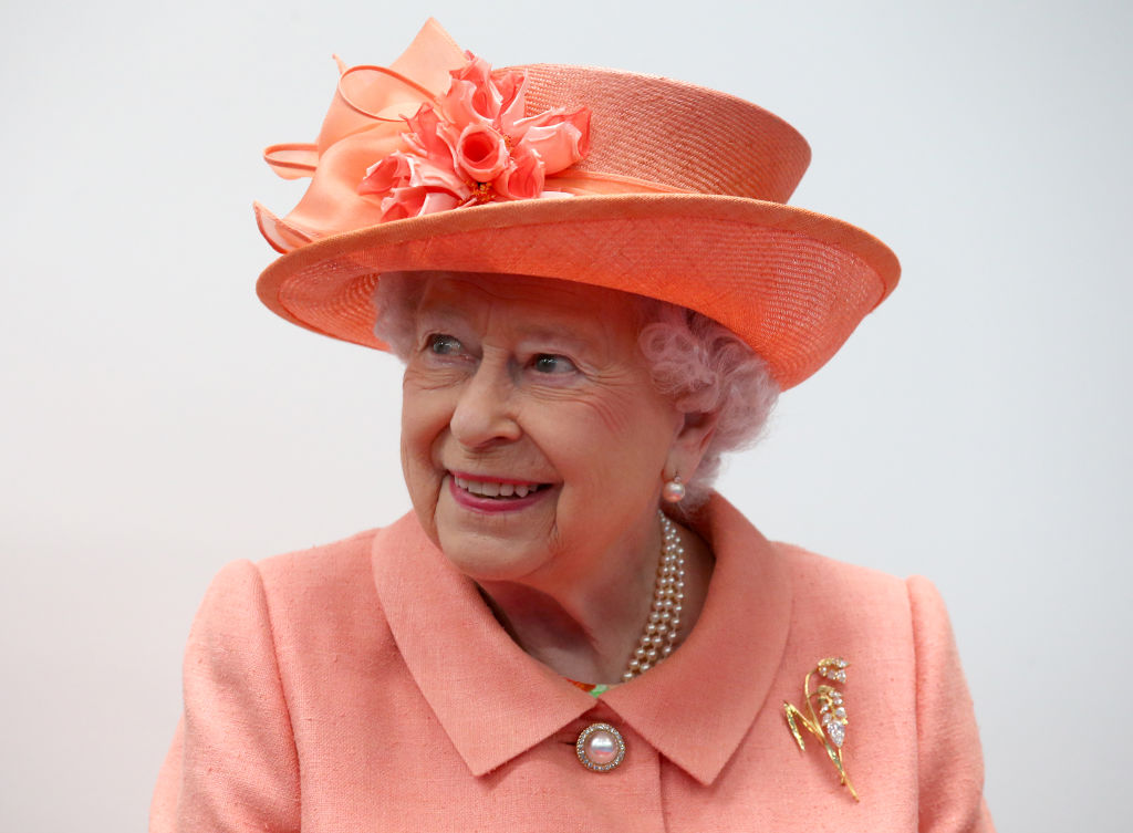 Queen Elizabeth II wearing Botswana Flower brooch.
