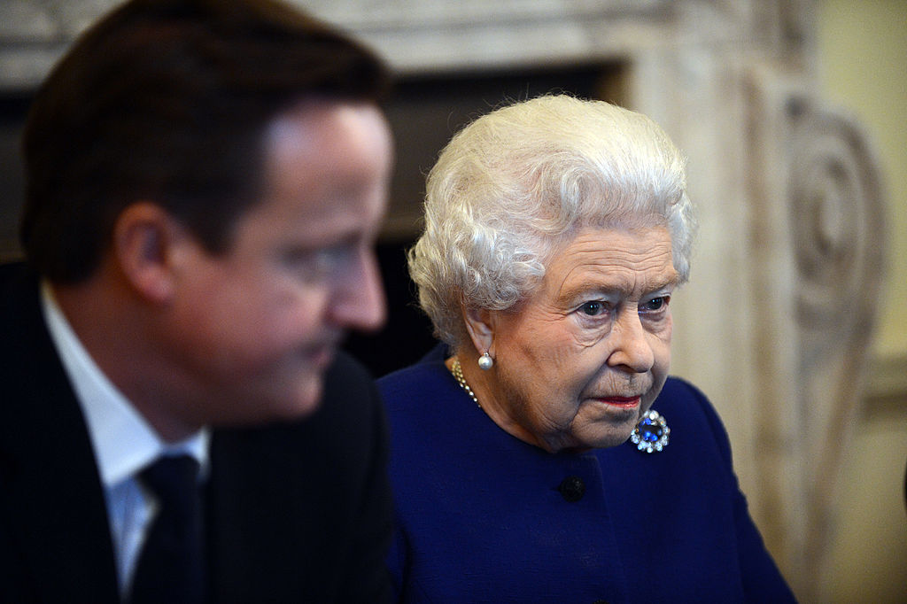 Queen Elizabeth II wearing brooch.
