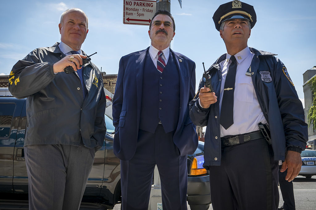 Tom Selleck on the set of Blue Bloods|Mike Pniewski, Tom Selleck, Esai Morales.  (Photo By Jeff Neumann/CBS via Getty Images