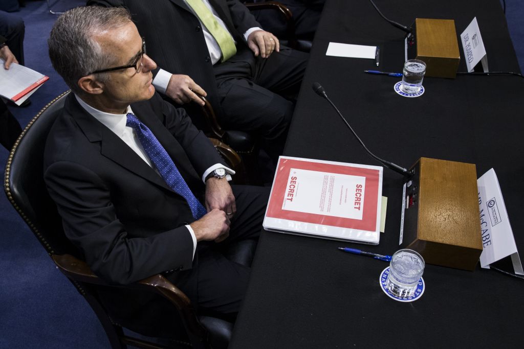 Classified material in front of Andrew McCabe, Acting Director of the FBI