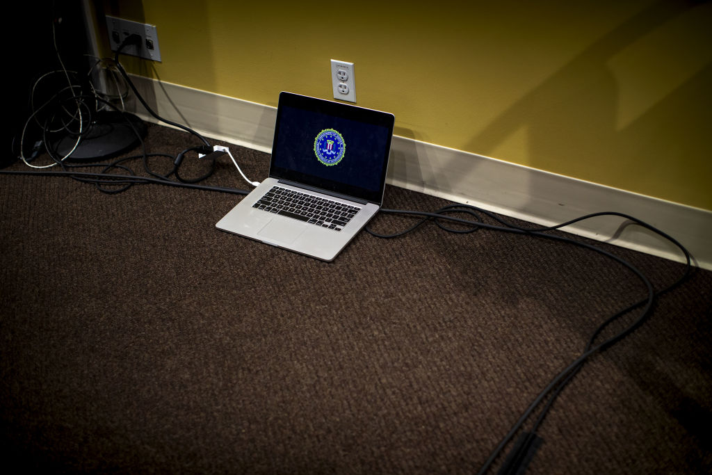 Computer before a news conference at the FBI headquarters