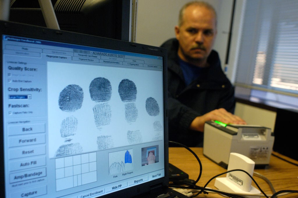 man gets fingerprinted