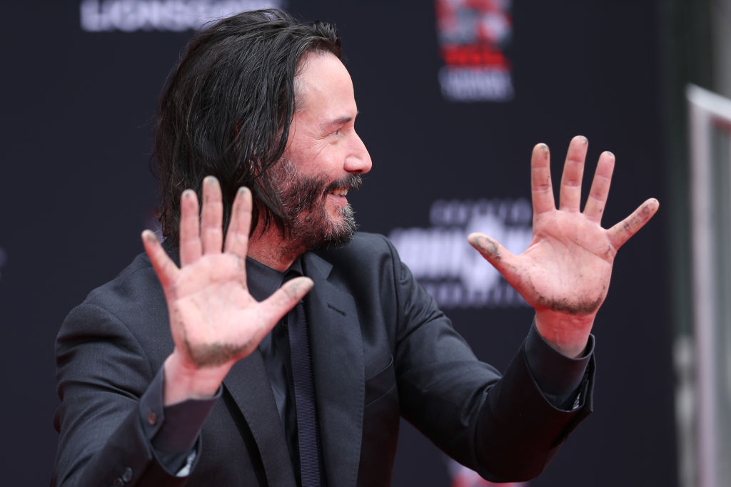 Keanu Reeves attends a handprint ceremony honoring him